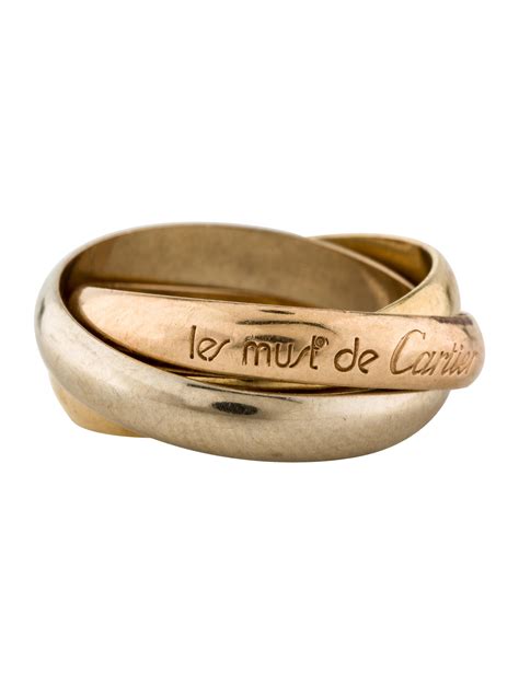 les must de cartier meaning